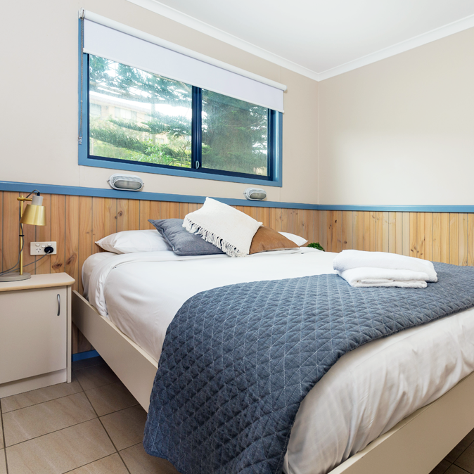 Queen bedroom in Tuross Beach elevated beach unit